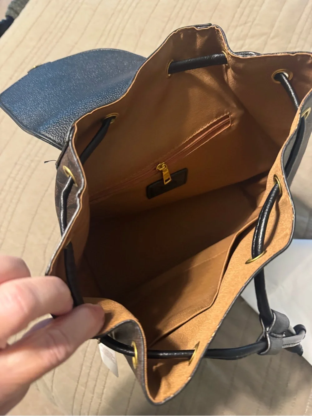 Coach Brown Signature Drawstring Backpack with Black Trim and Gold Hardware